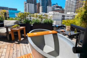 A stone soaking tub on the roof of 1 Hotel San Francisco lets you indulge in a mineral bath right in the midst of the city's famous fog. Photo by Craig Stoltz