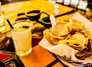 Closeup of margarita, chips and salsa at El Encanto in Cave Creek, on the list of author's list of where to eat in Scottsdale.