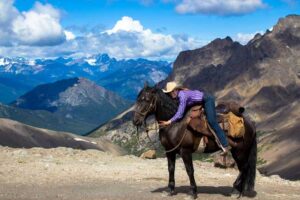 A horse packing trip in British Columbia offers adventure and incredible views. Photo by Tsylos Lodge