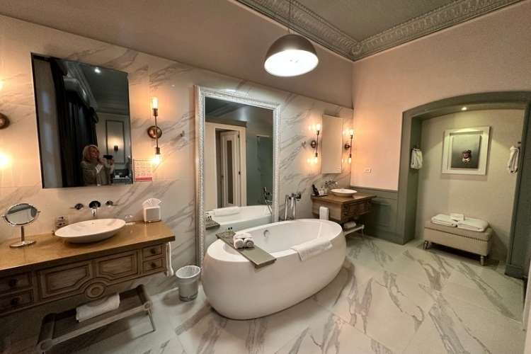 Luxurious hotel bathroom with signature products