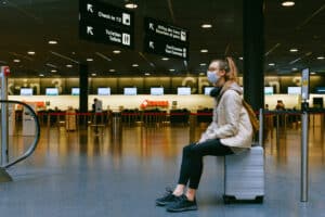 Travel in airport with masks during pandemic.