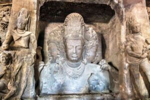 Trimurti Sadashiva sculpture in the cave 1 on Elephanta Island. Mumbai - Maharashtra, India