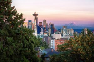 View of Seattle with trees. Photo by Luca Micheli, Unsplash